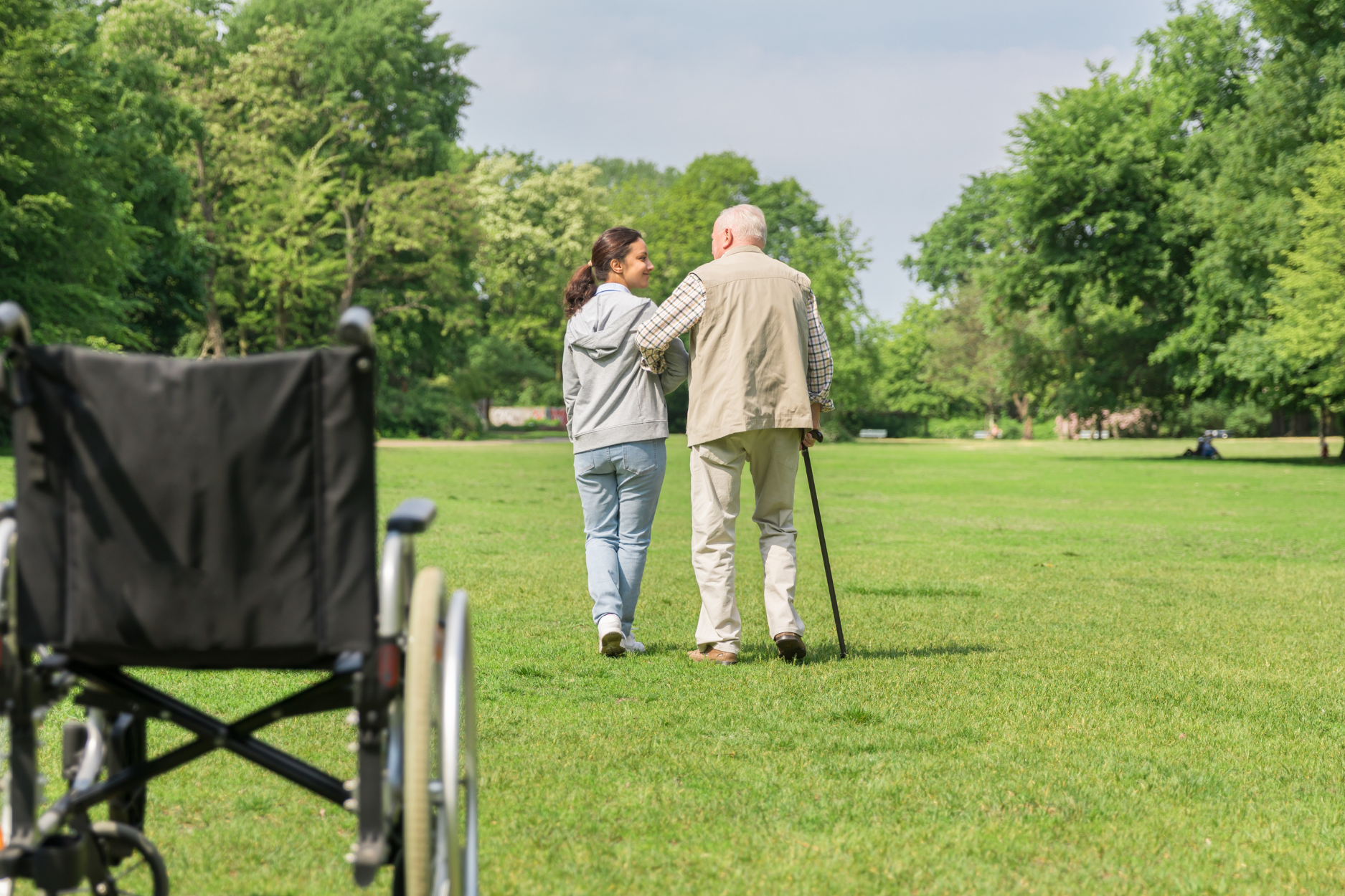 Caregiver providing companion care to a client at home